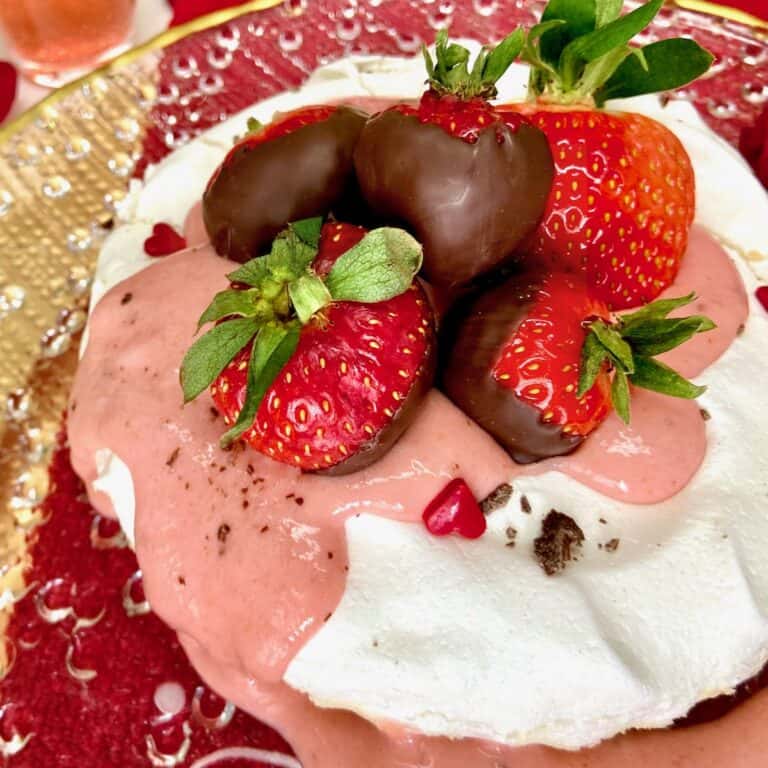 Pavlova with Strawberry curd and chocolate dipped strawberries.