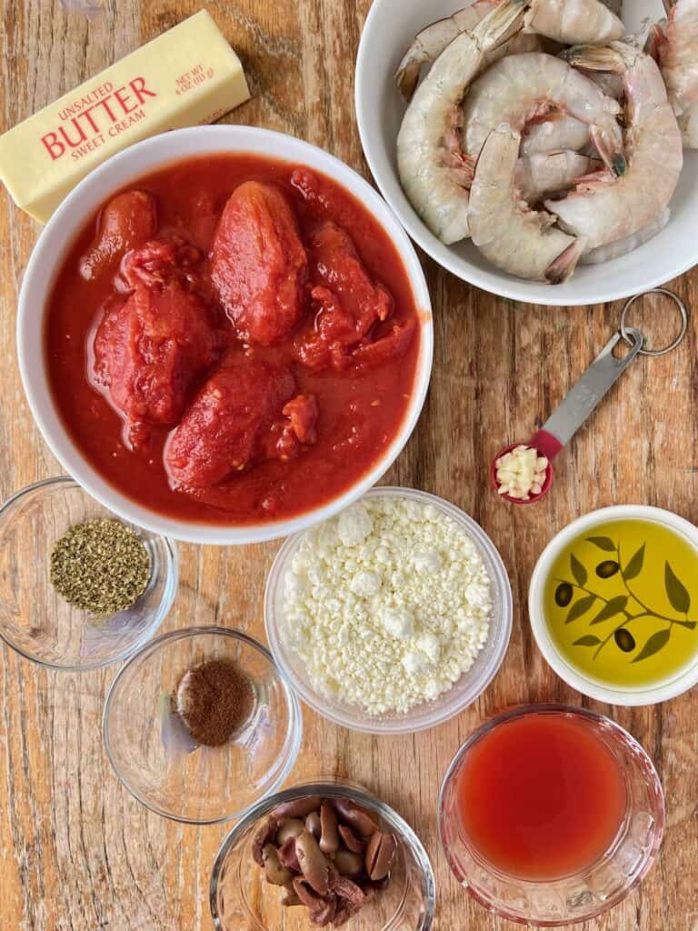 Ingredients in bowls on a wooden table.