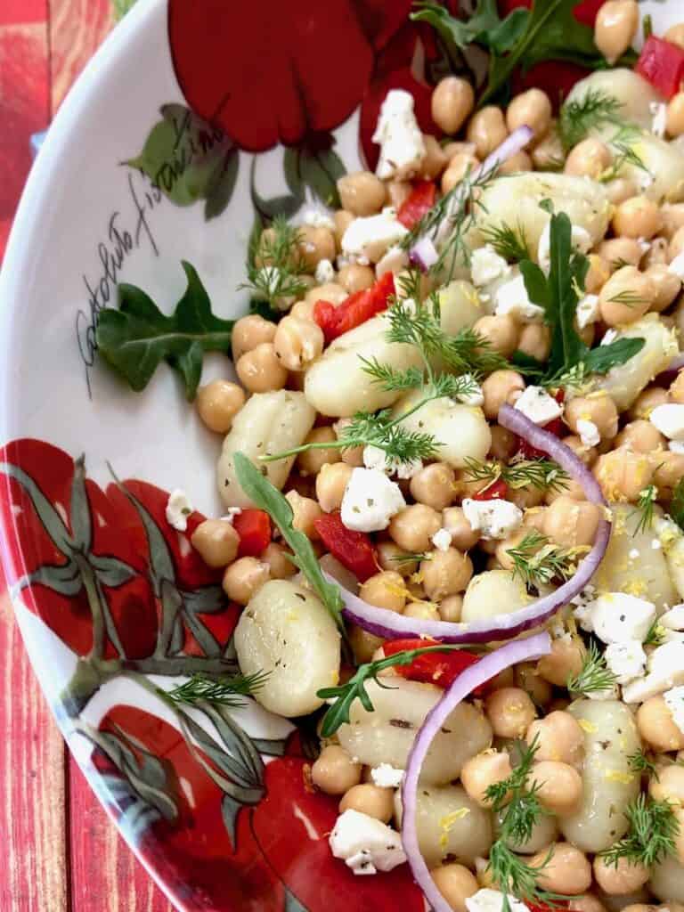 Close up of Mediterranean Gnocci in decorative bowl.