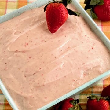 Strawberry cake in blue baking pan.
