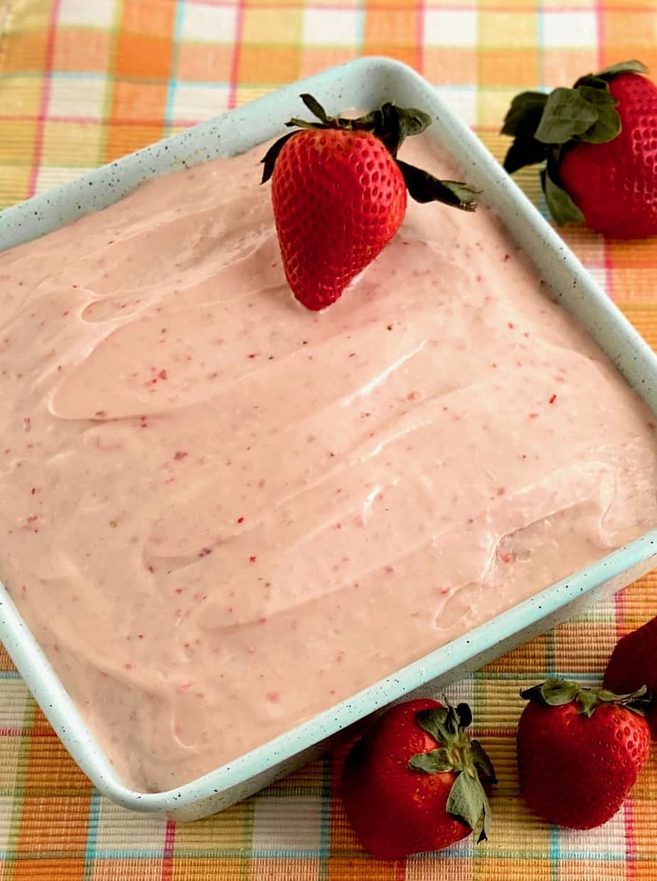 Strawberry cake in blue baking pang.