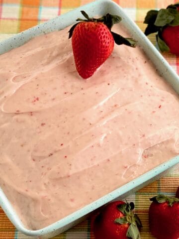 Strawberry cake in blue baking pan.