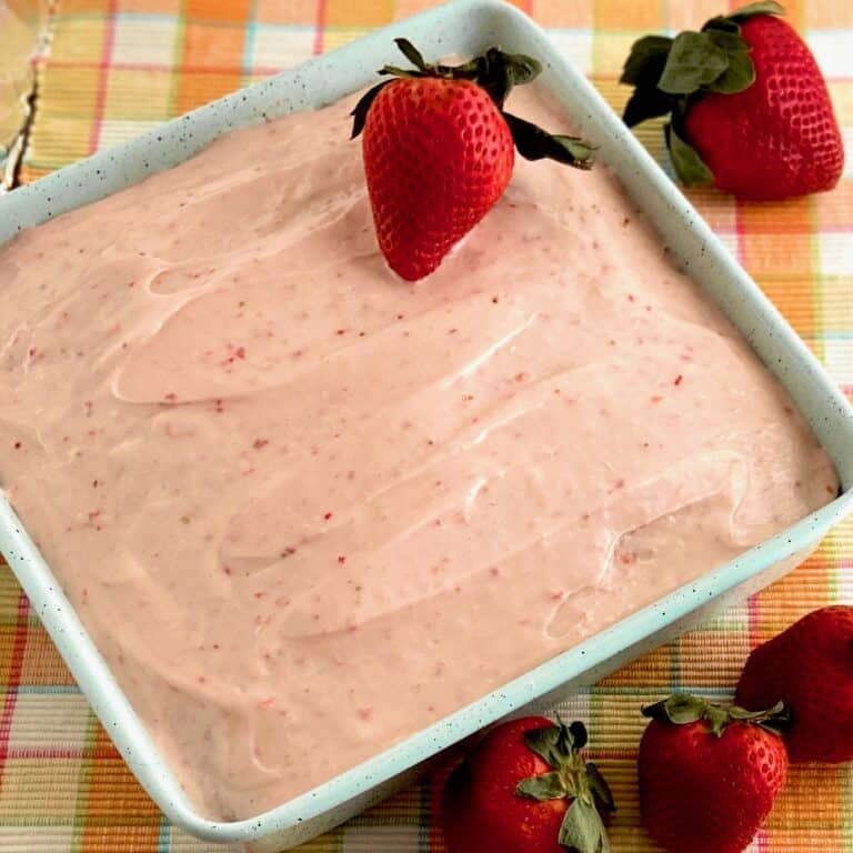 Strawberry cake in blue baking pan.