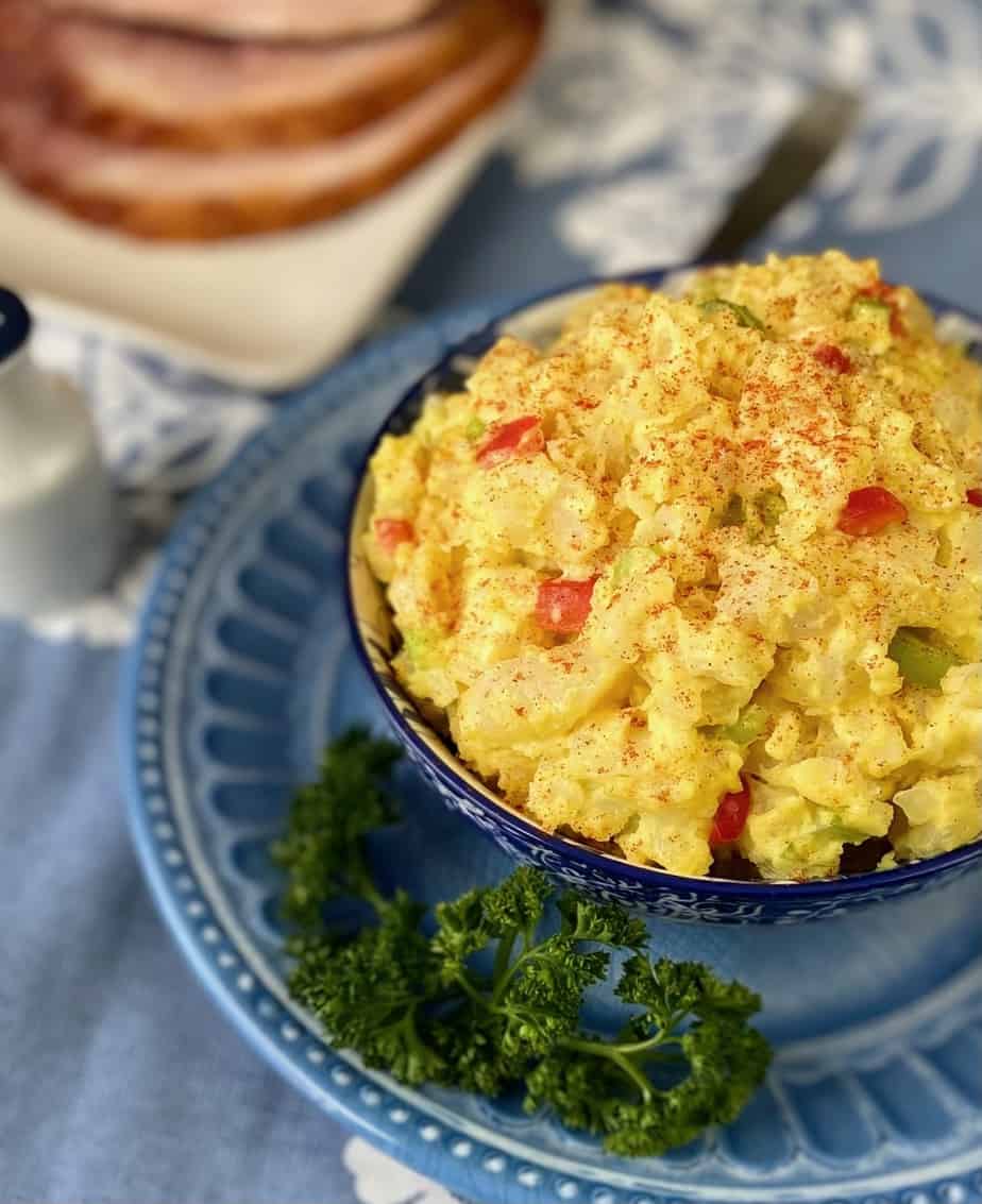 Southern potato salad in decorative blue bowl.
