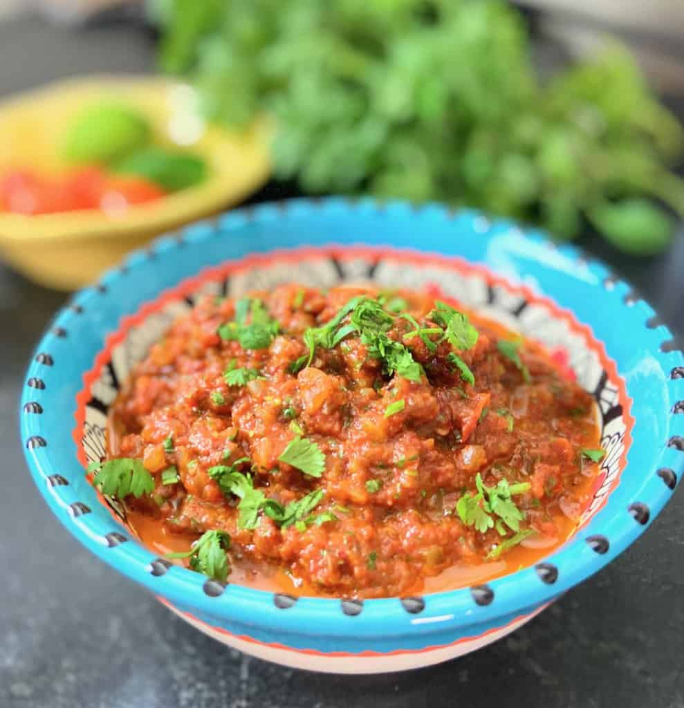 Ranchero sauce in decorative bowl.