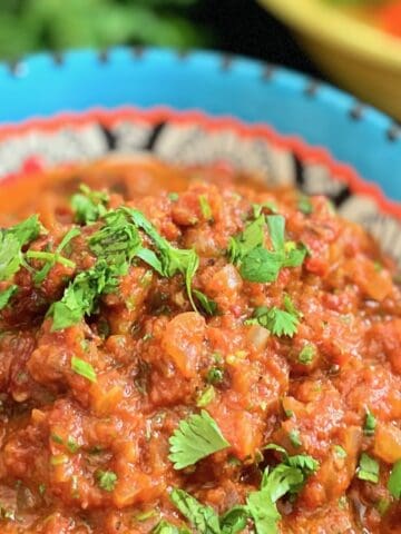 Ranchero sauce in decorative bowl.