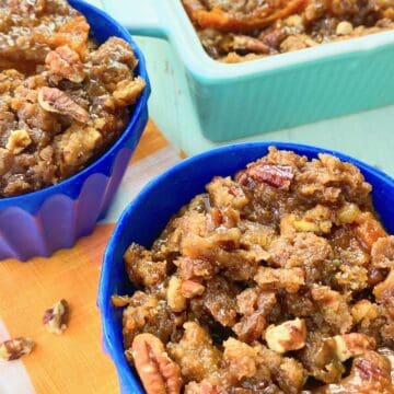 Carrot souffle in a blue ramekin.