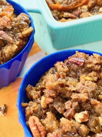 Carrot souffle in a blue ramekin.