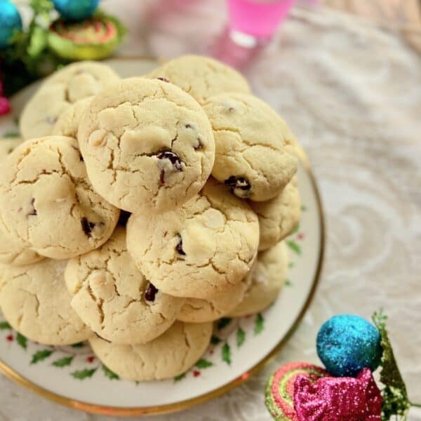 Cookies stacked on decorative plate.