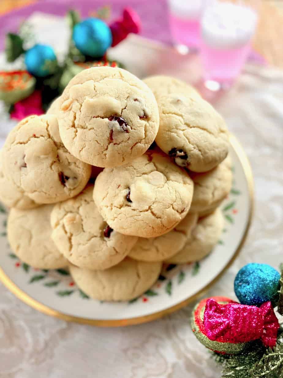 White chocolate and Cranberry cookies stacked on decorative plate.