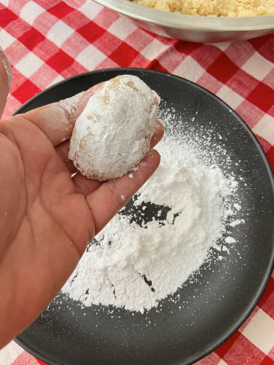 Cookie dough coated in powdered sugar.