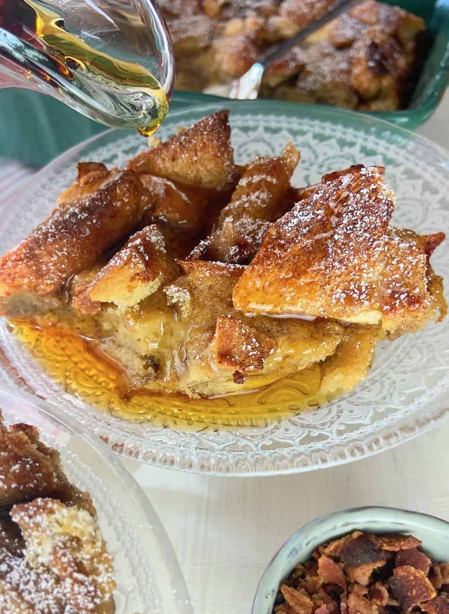 Maple syrup being drizzled over french toast.