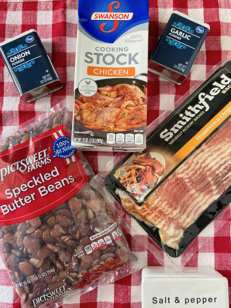 Ingredients on red and white checkered tablecloth.