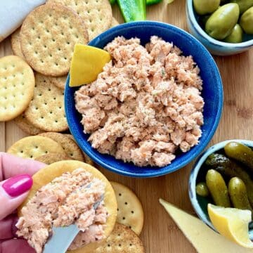 Smoked salmon spread in blue serving bowl.