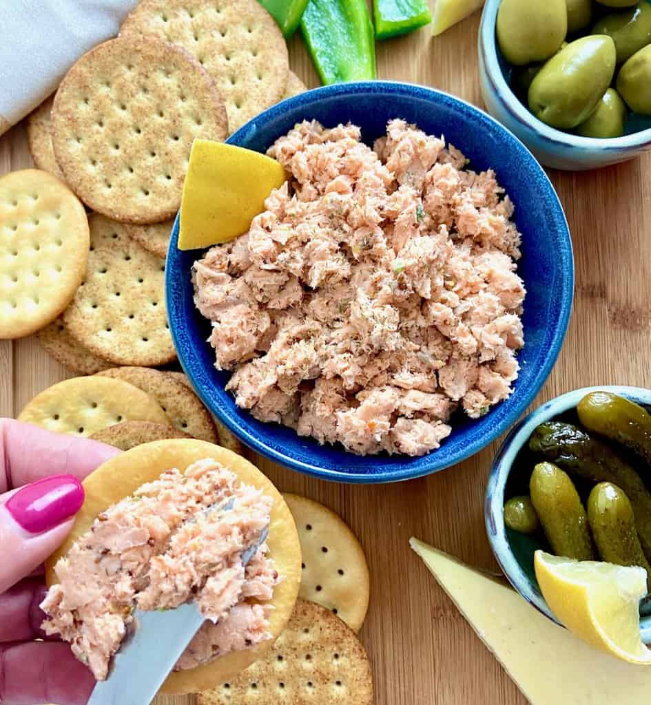 Smoked salmon spread in blue serving bowl.