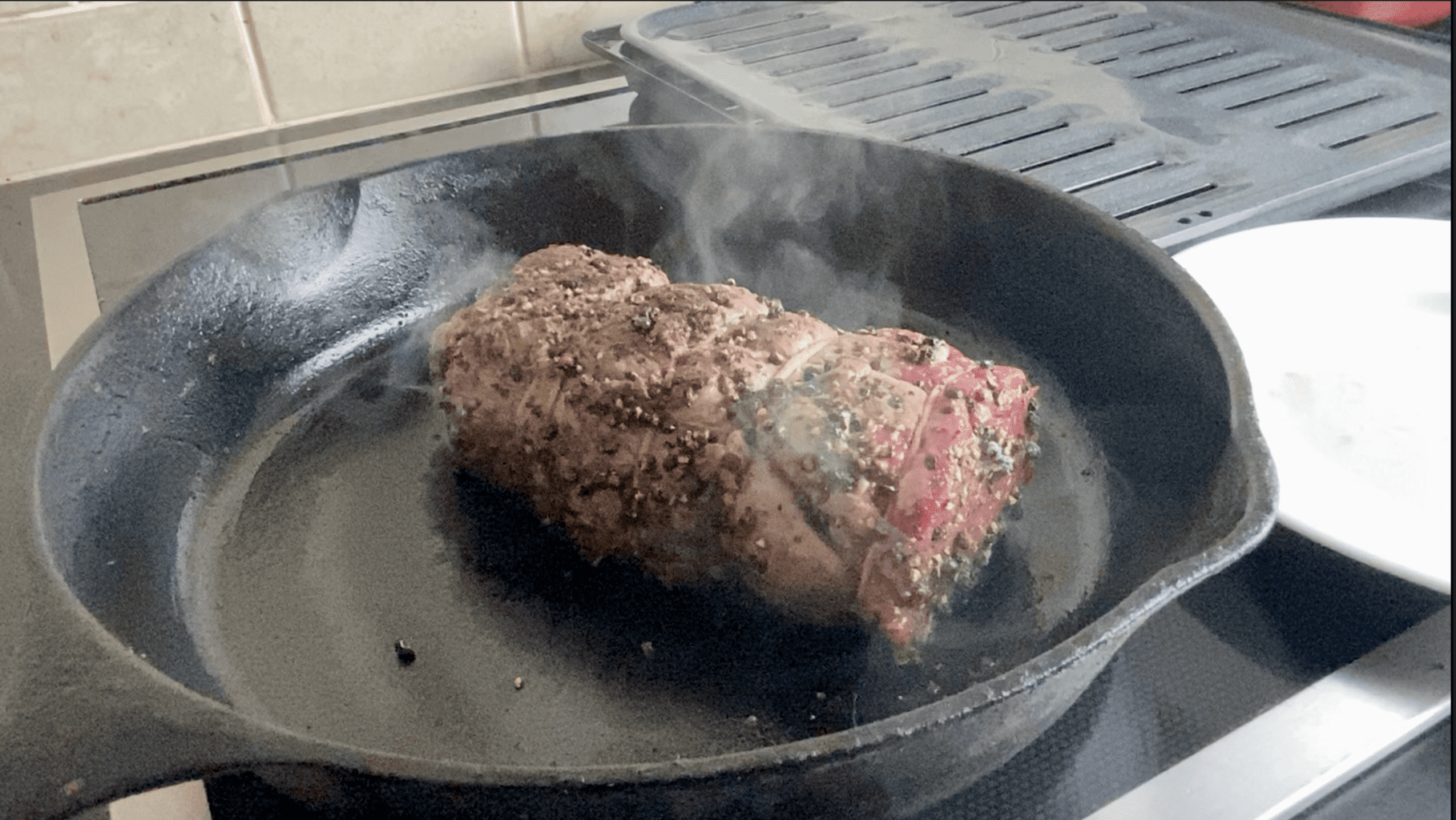 Tenderloin in cast iron skillet.