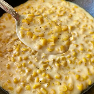 Creamed corn in cast iron skillet.