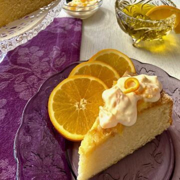 Orange cake on purple plate.