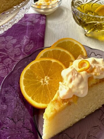 Orange cake on purple plate.