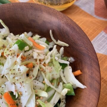 Coleslaw in wooden bowl.