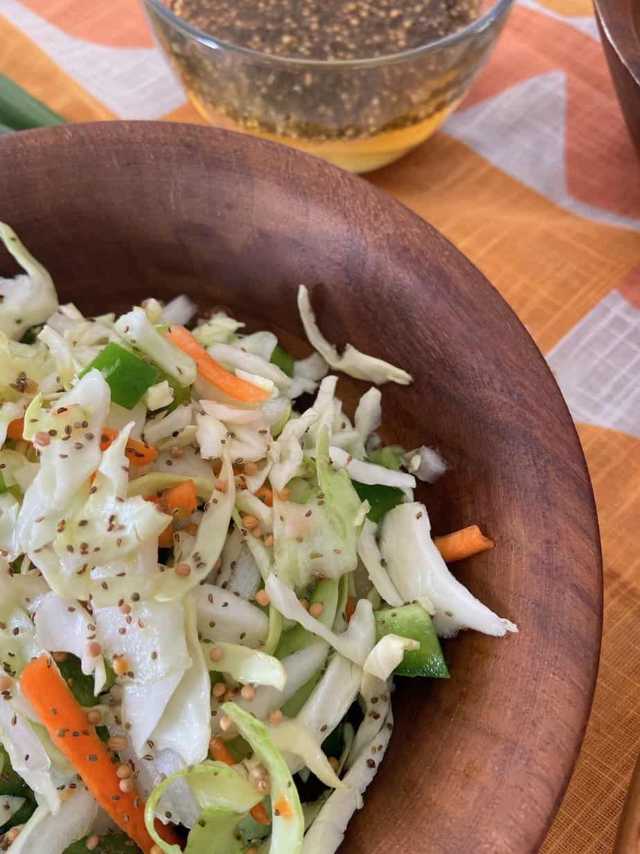 Coleslaw in wooden bowl.