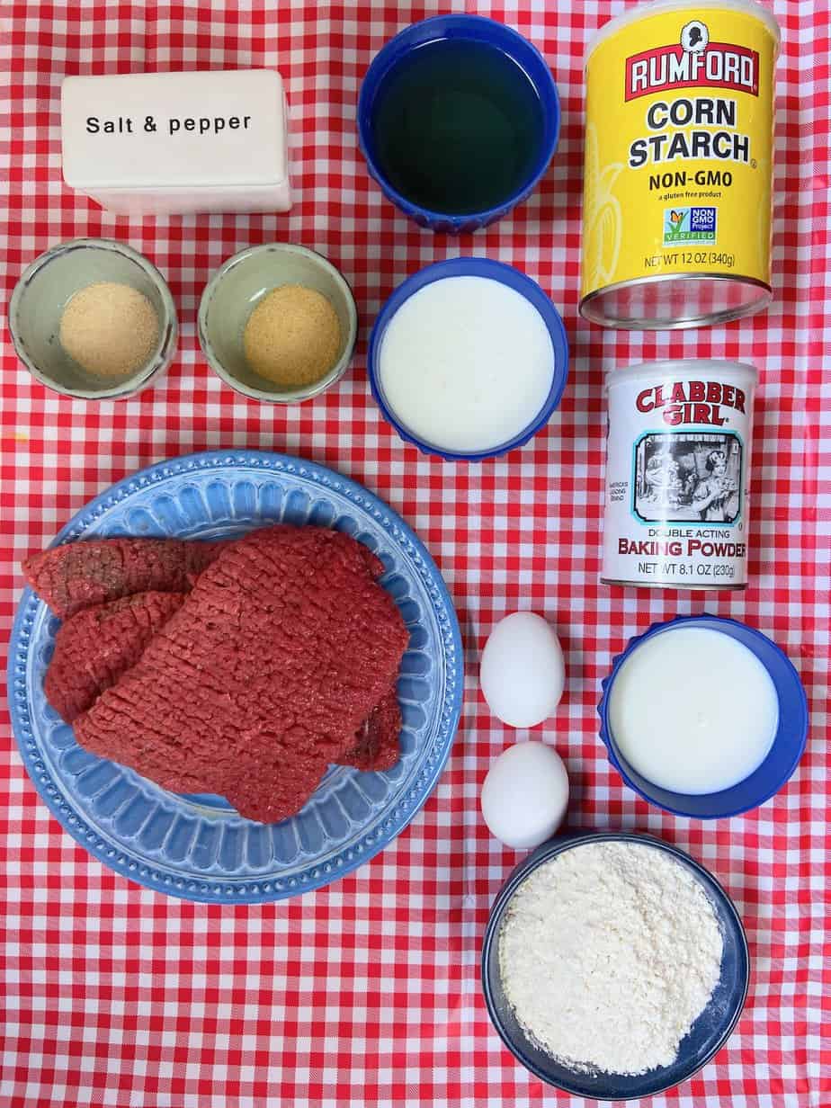 Ingredients for Dairy Queen steak fingers on red checkered tablecloth.