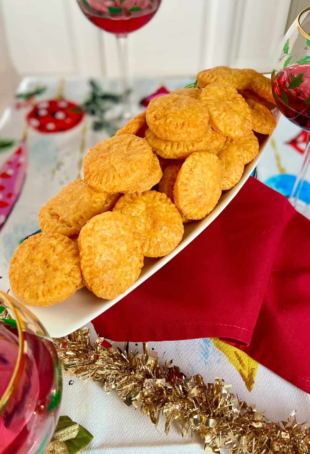 Cheddar wafers on oblong serving tray.