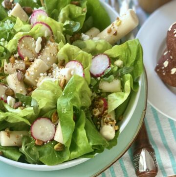 Hearts of palm salad in white bowl.