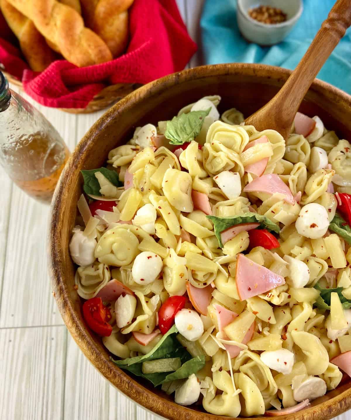 Hawaiian pasta salad in wooden serving bowl.