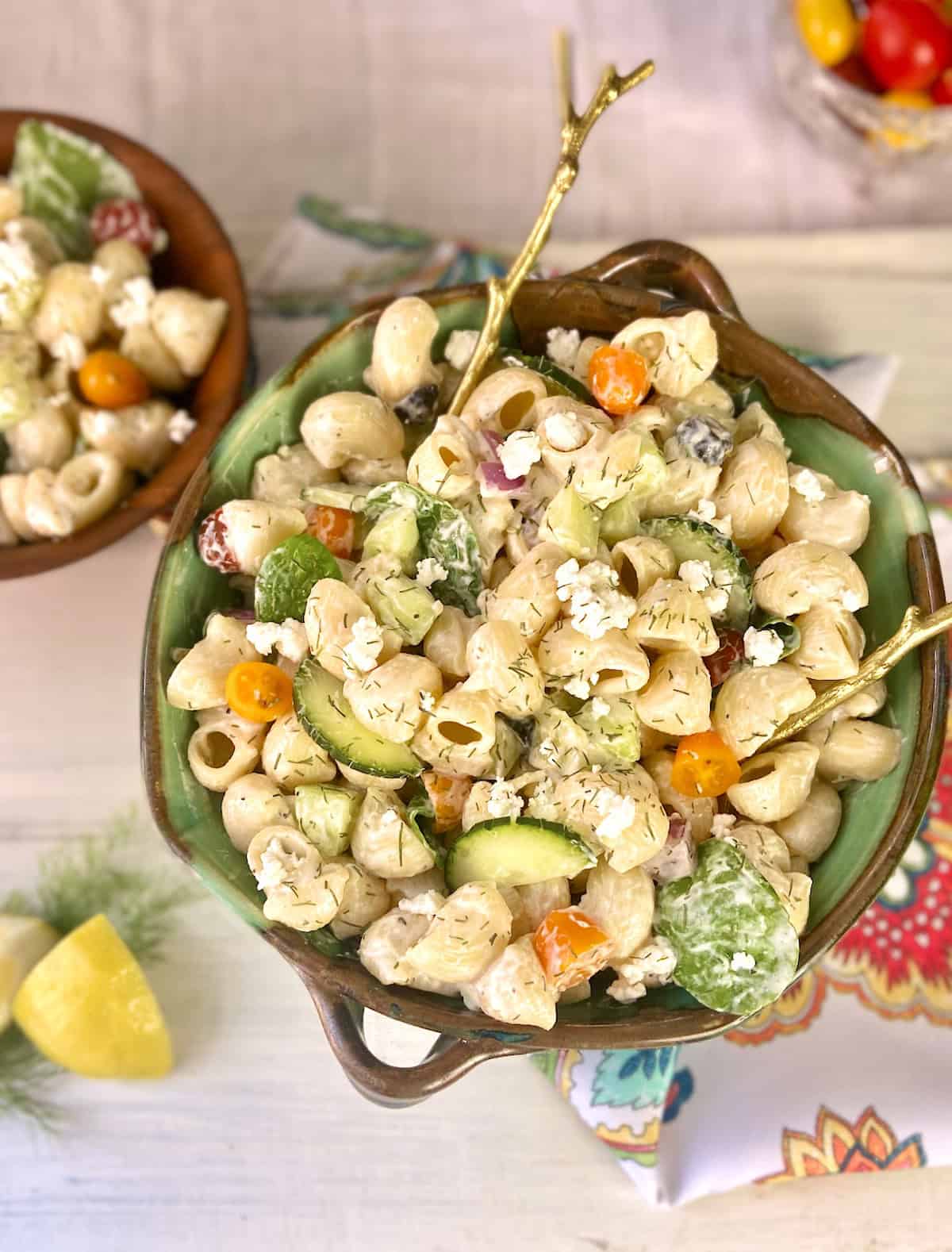 Mediterranean Pasta Salad in decorative green serving bowl.