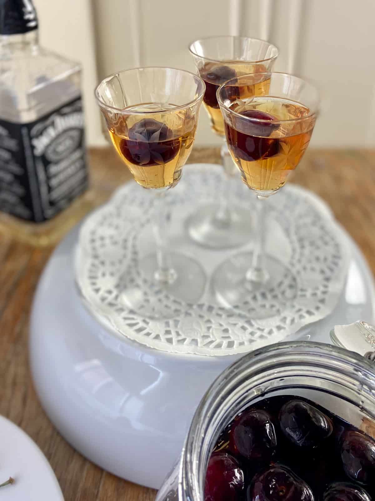 Cherry Bounce in cordial glasses.