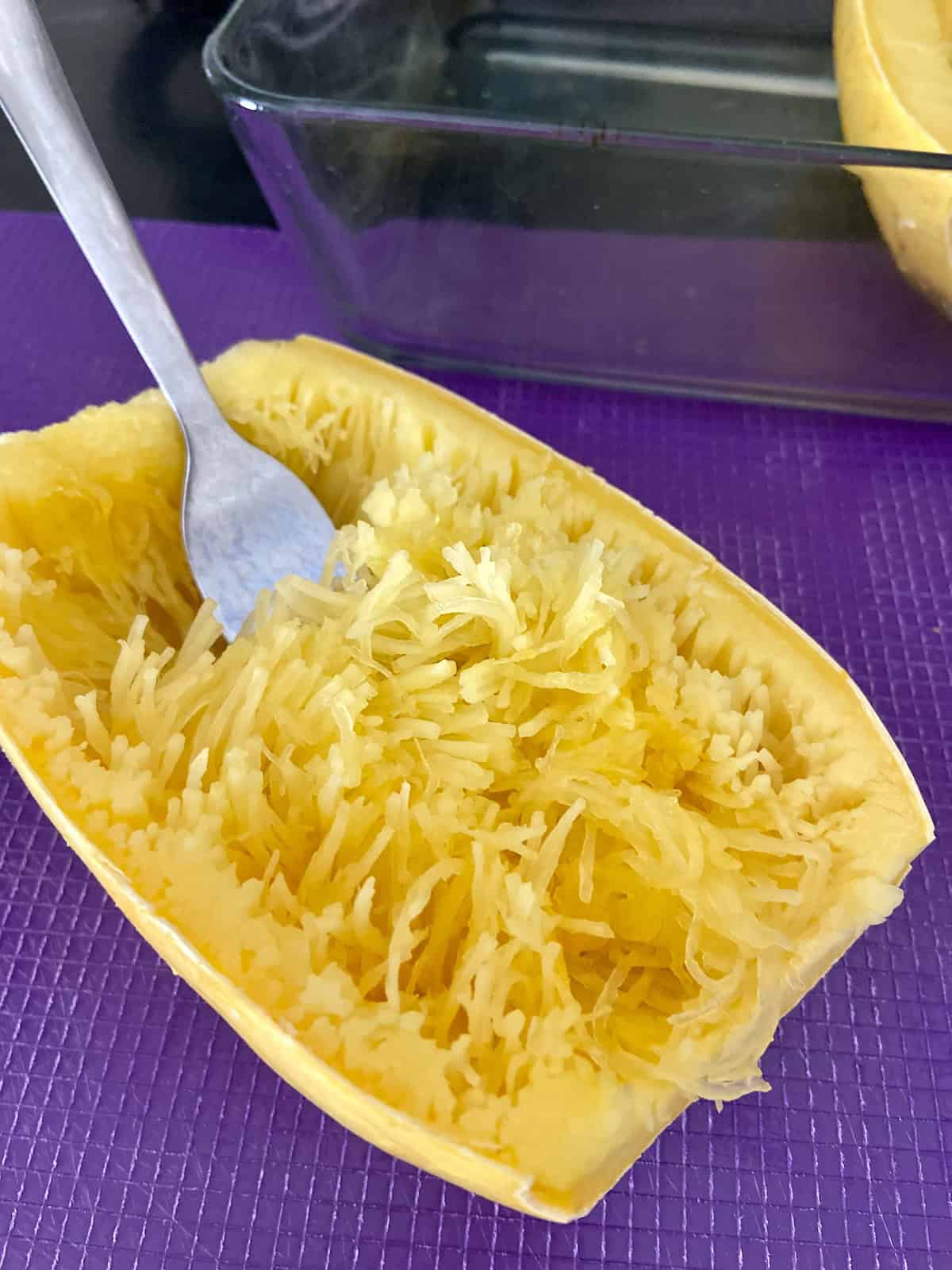 Spaghetti squash strands and fork.