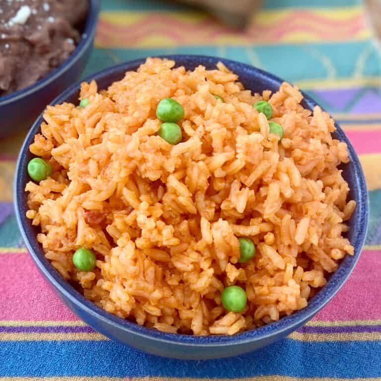 Mexican rice in blue bowl.