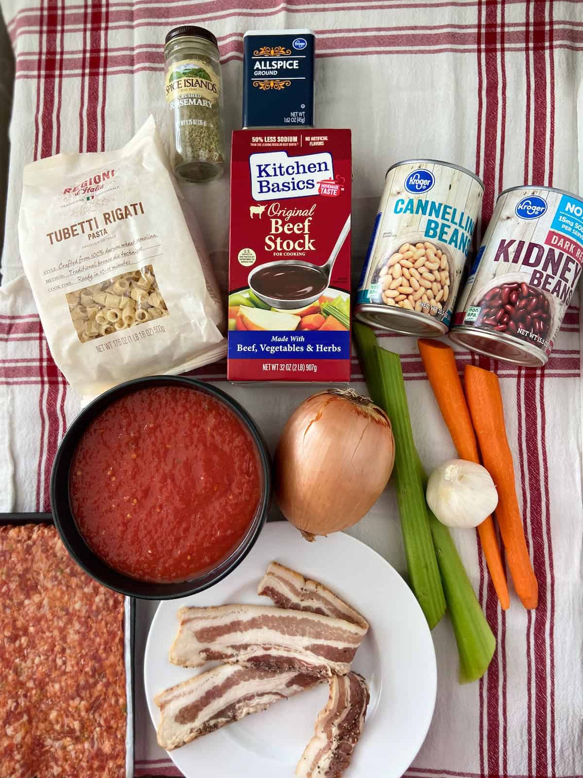Ingredients for pasta fagioli on table.