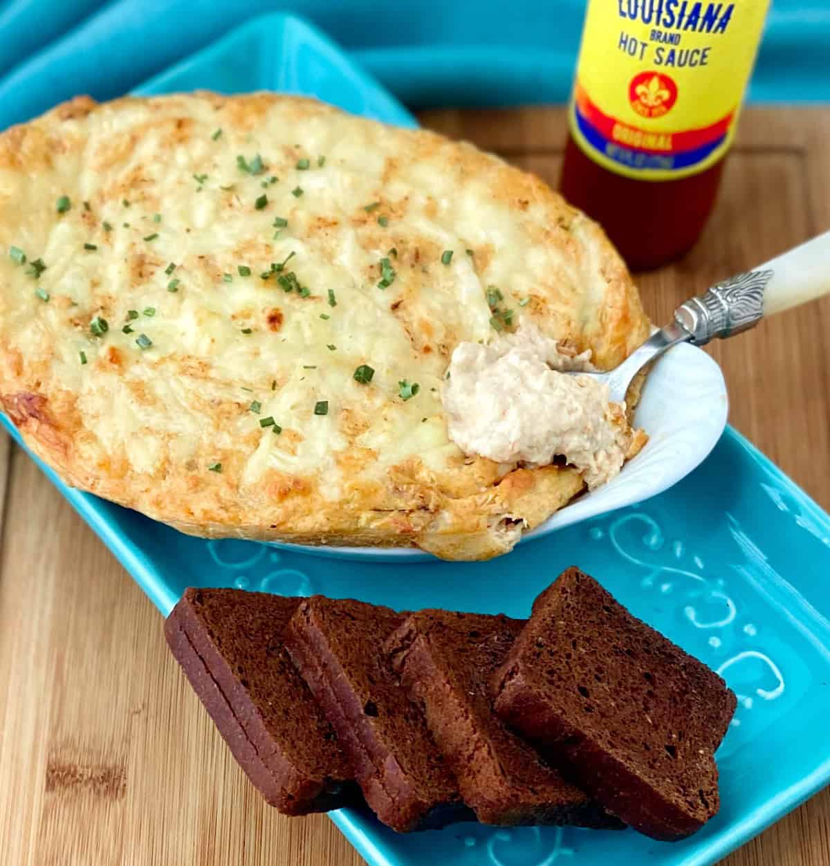 Hot Cajun Crab Dip on serving spoon.