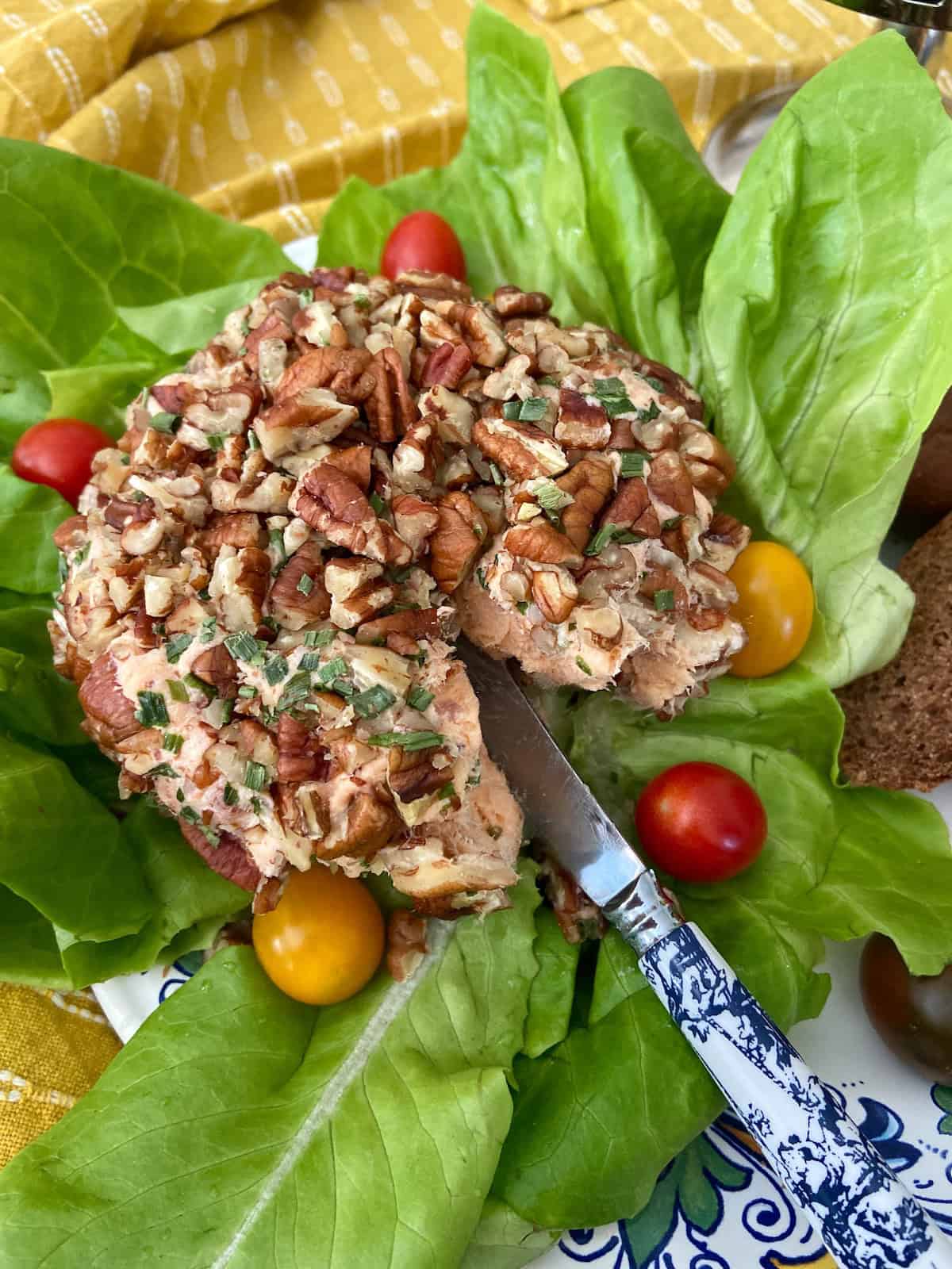 Sliced smoked salmon cheeseball.