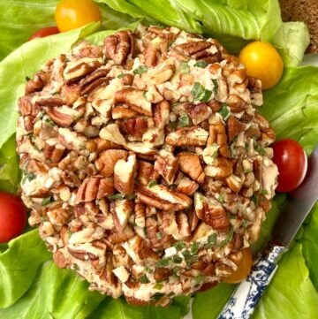 Smoked salmon cheeseball coated with chopped pecans and chives.