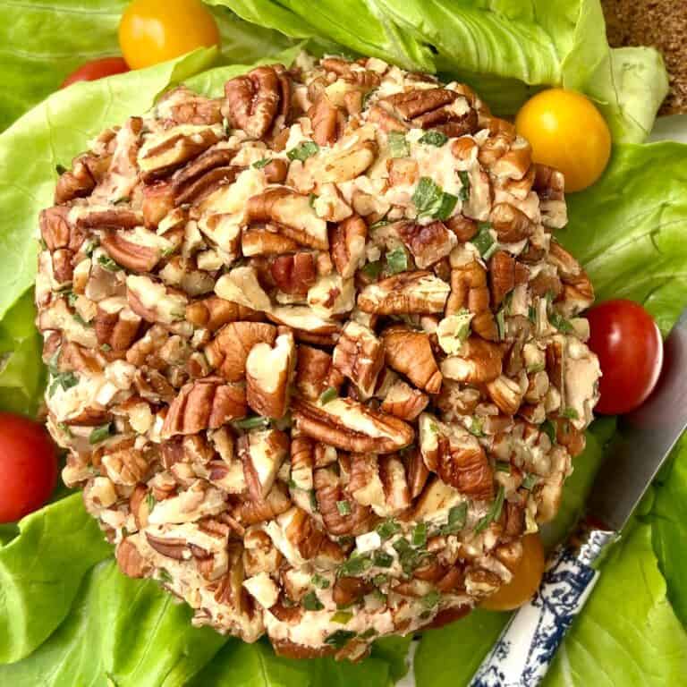 Smoked salmon cheeseball coated with chopped pecans and chives.