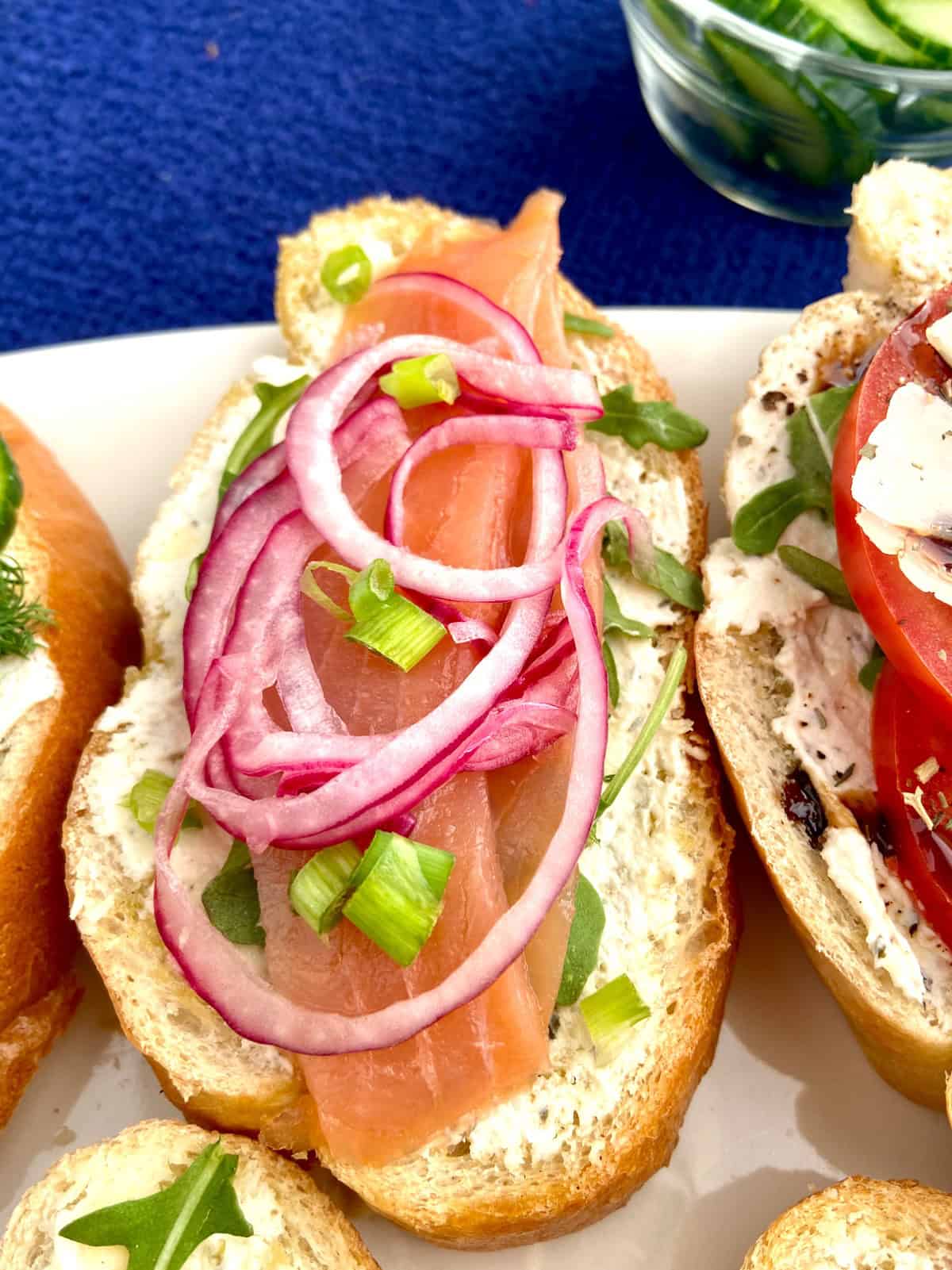 Salmon on bruschetta.