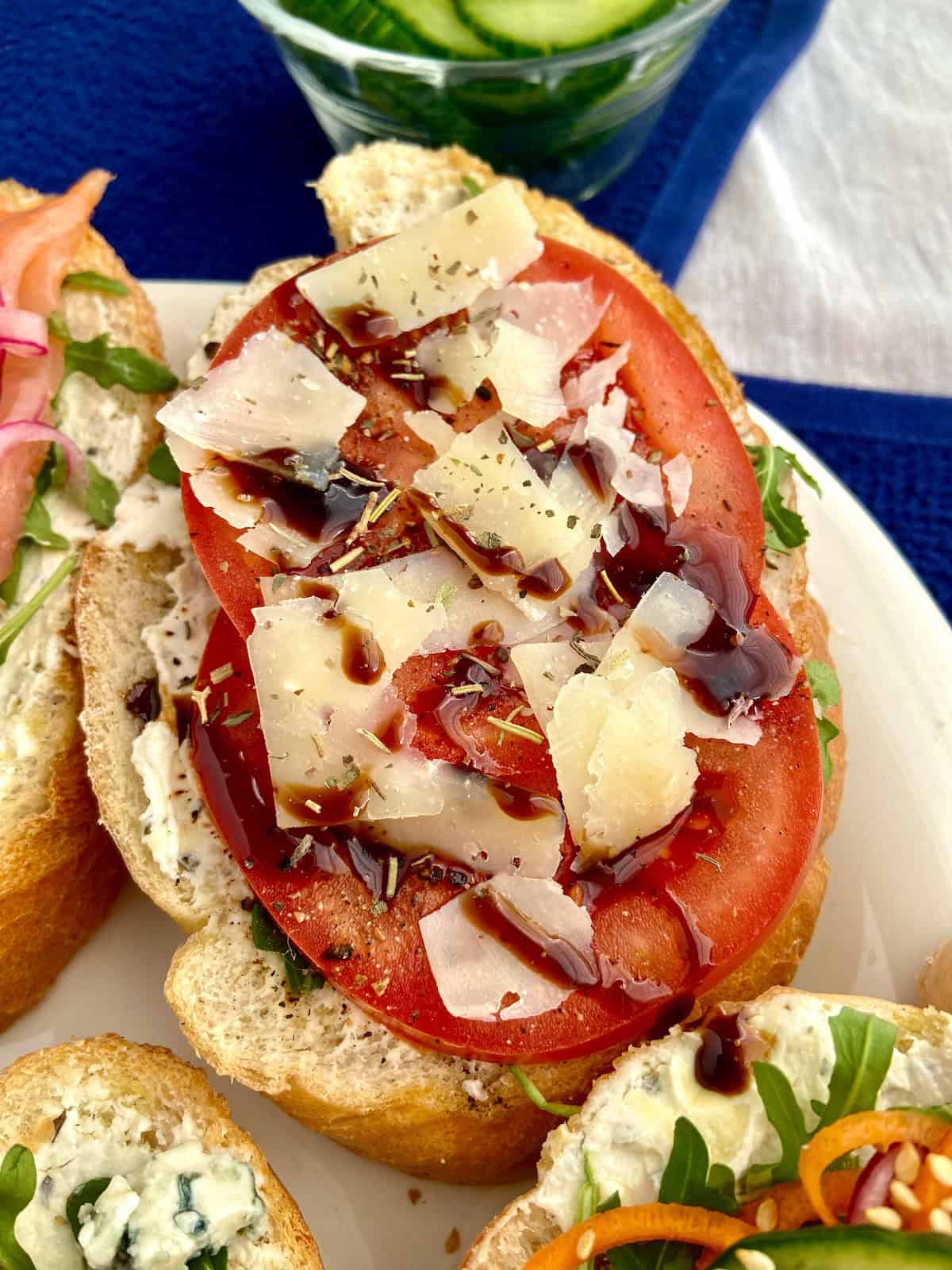 Tomatoes, shaved parmesan and balsamic glaze on toast.