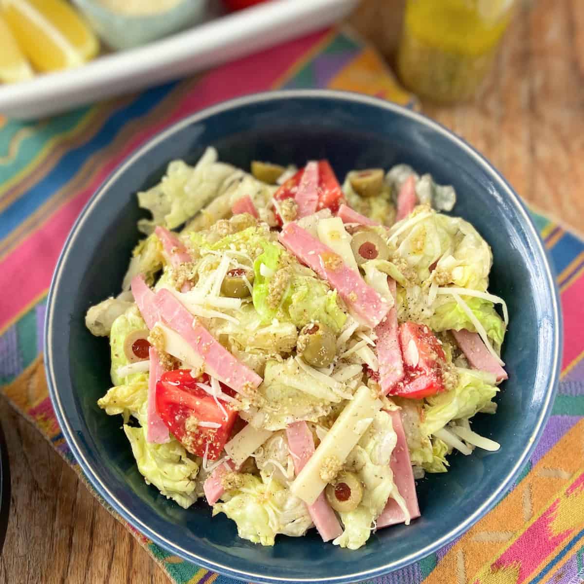 1905 Salad in blue bowl.