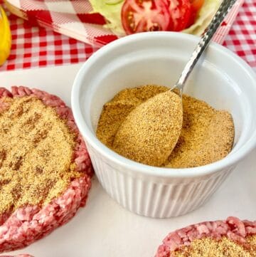 Spoon in dry hamburger seasoning mix.