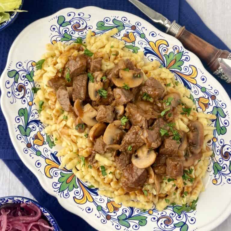 Braised beef tips with mushrooms and brown gravy on Spaetzle egg noodles.