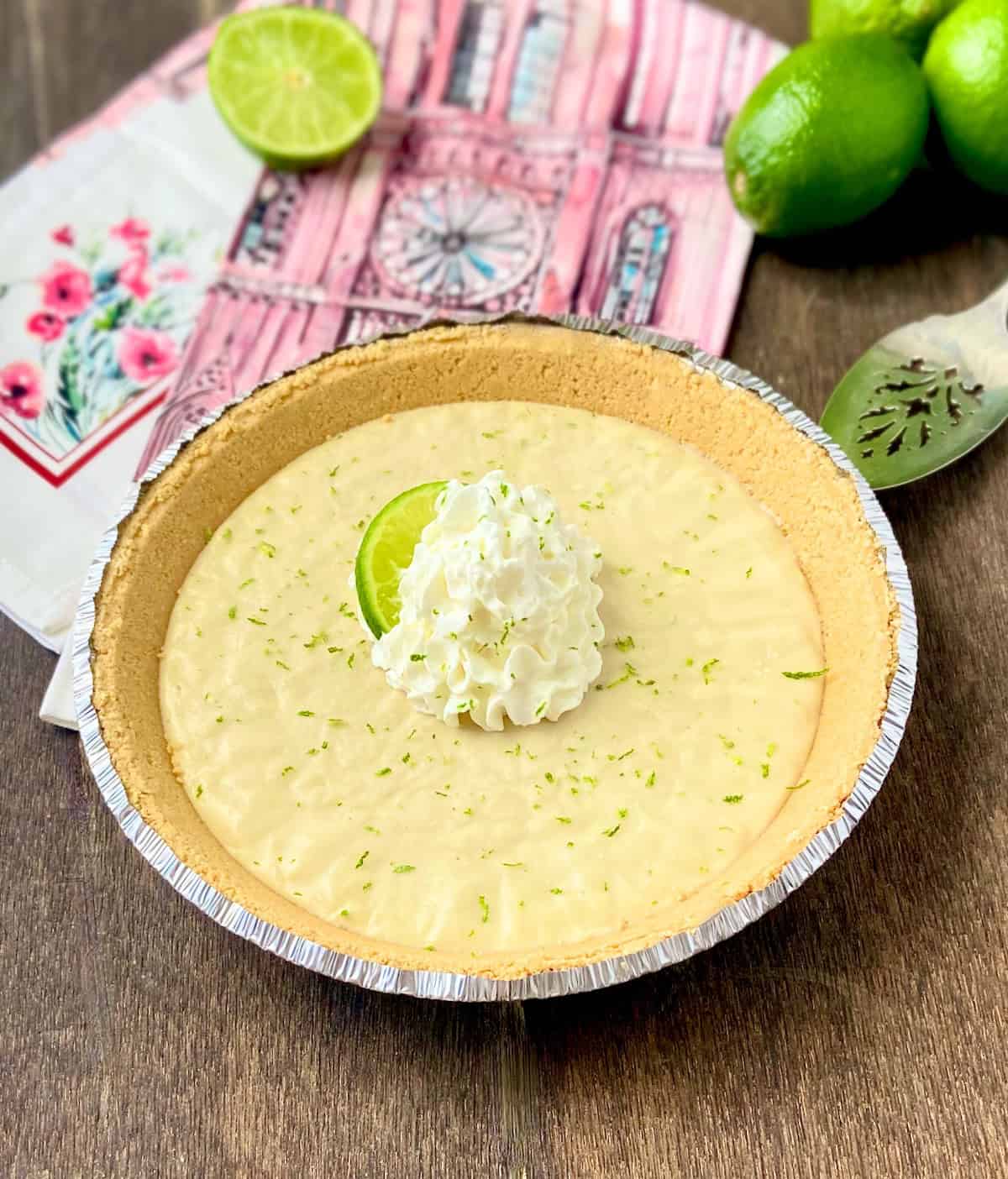 No Bake Key Lime Icebox Pie on brown wooden table.