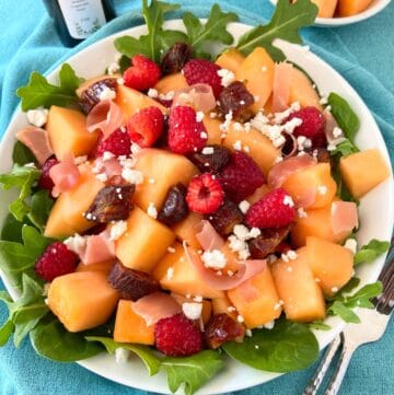 Macerated Fruit Salad in white serving bowl.