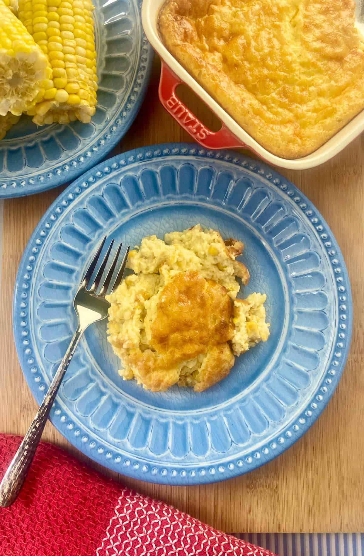 Southern Corn Pudding on blue plate.