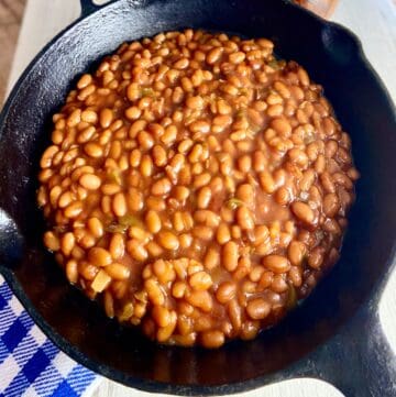 Baked beans in cast iron skillet.