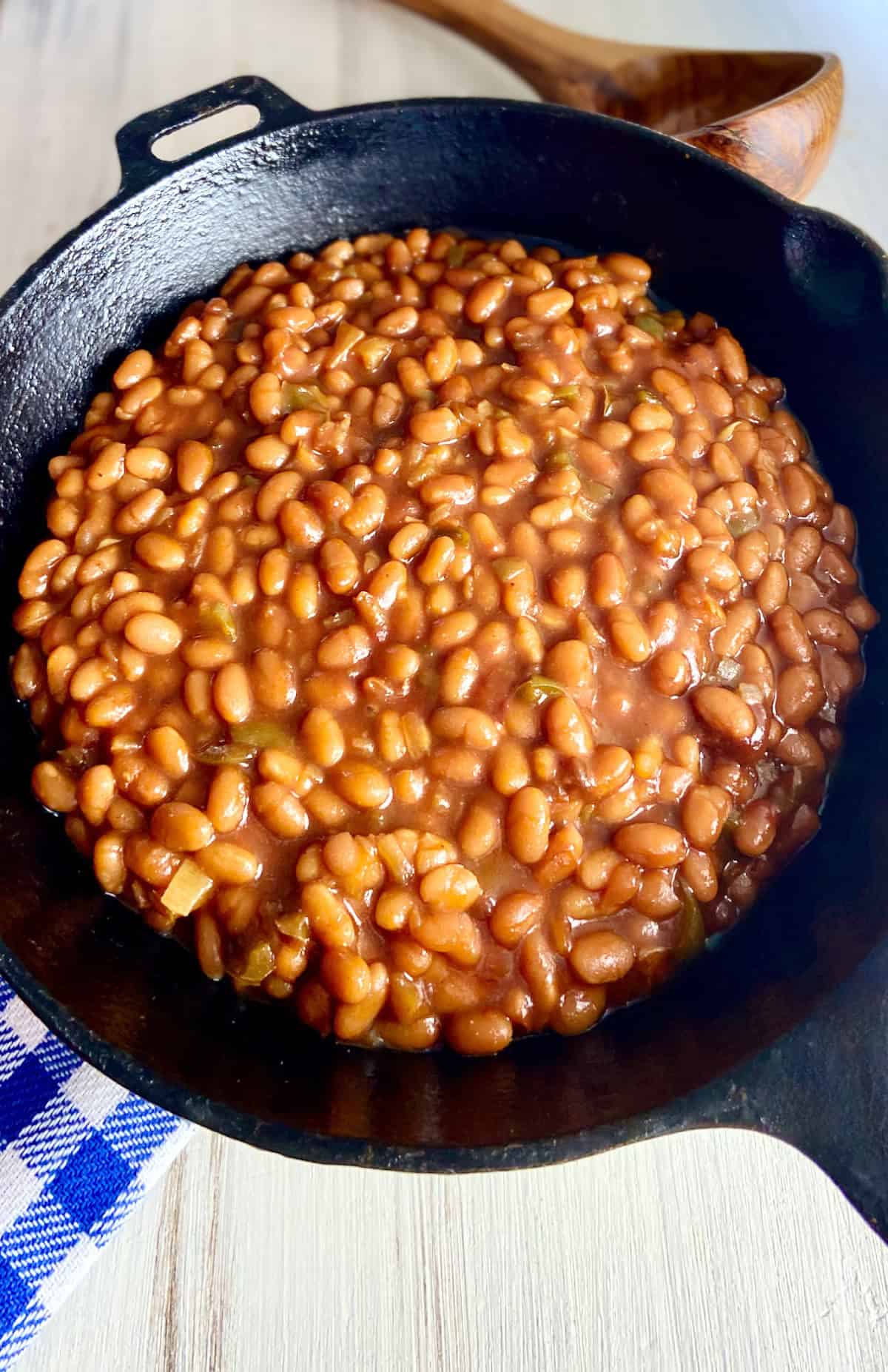 Southern Baked Beans in cast iron skillet.