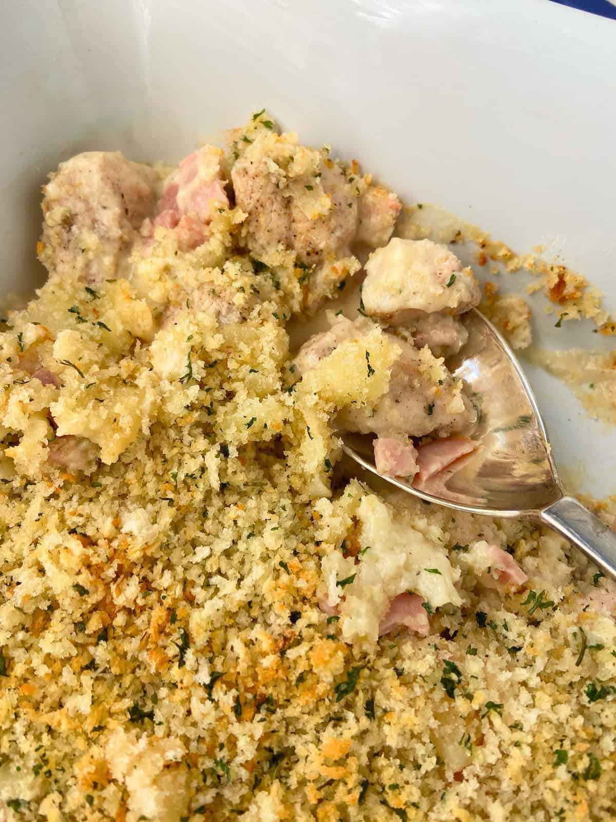 Close up spoonful of Cordon Bleu casserole.