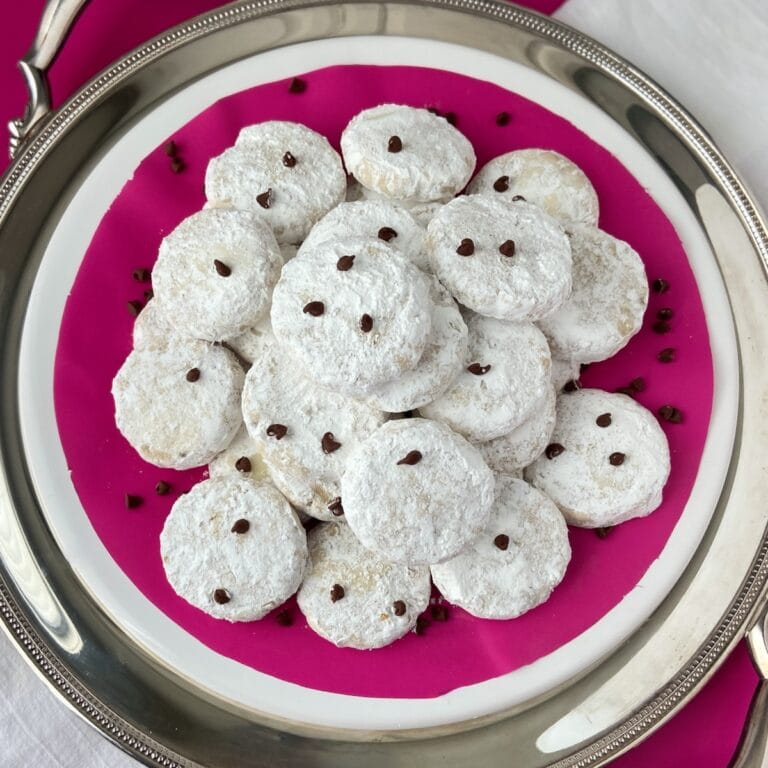 Danish Wedding Cookies on pink platter.